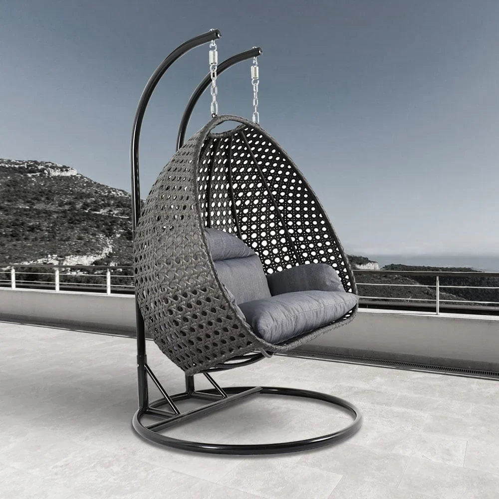 LeisureMod 2 Person Hanging Egg Chair with Stand - Outdoor/Indoor Rattan Wicker Patio Swing Hammock Lounger with Cushions
